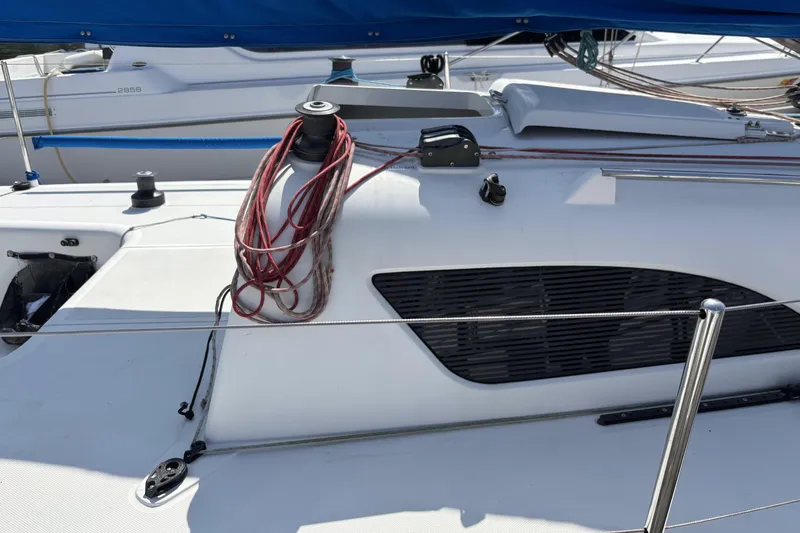 Slide: The Image of Sailboat deck of 2007 Flying Tiger FT-10M with ropes and winch. - 7