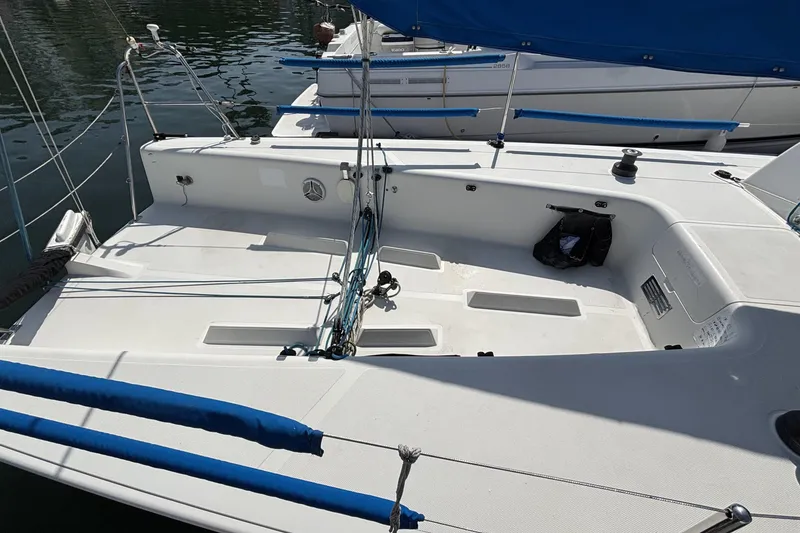 Slide: The Image of Sailboat cockpit of a 2007 Flying Tiger FT-10M, featuring blue accents and rigging. - 8
