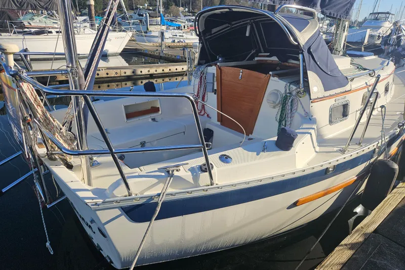 Slide: The Image of 2003 Pacific Seacraft Dana 24 sailboat docked at marina, rear view. - 3