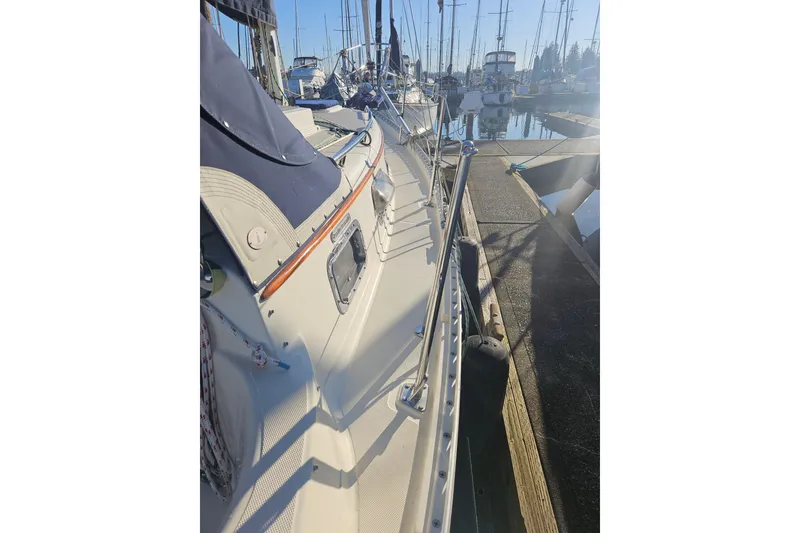 Slide: The Image of 2003 Pacific Seacraft Dana 24 sailboat docked at marina, side view. - 8