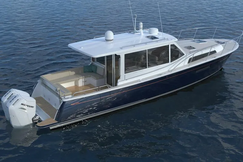 The Image of 2026 MJM 47R boat cruising on a sunny day with palm trees in the background. - 2