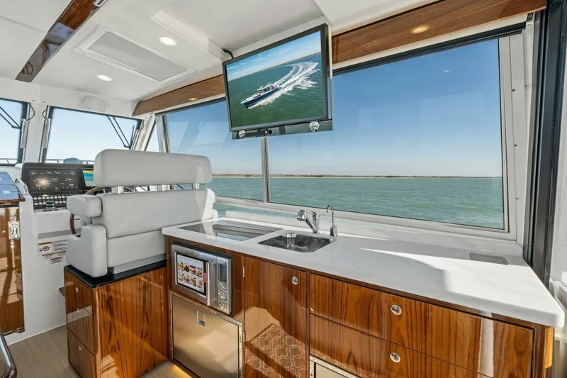 Slide: The Image of Luxurious interior of 2026 MJM 47R yacht with modern amenities and ocean view. - 21
