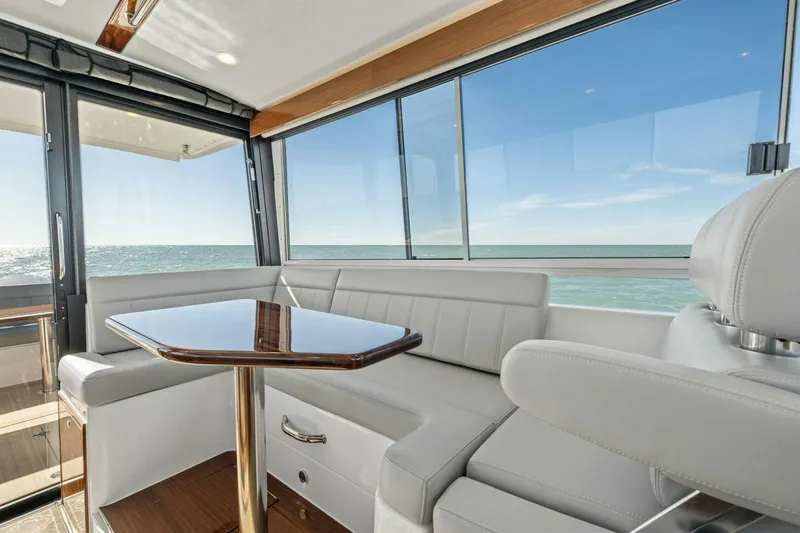 Slide: The Image of Luxurious interior of 2026 MJM 47R yacht with ocean view through large windows. - 23