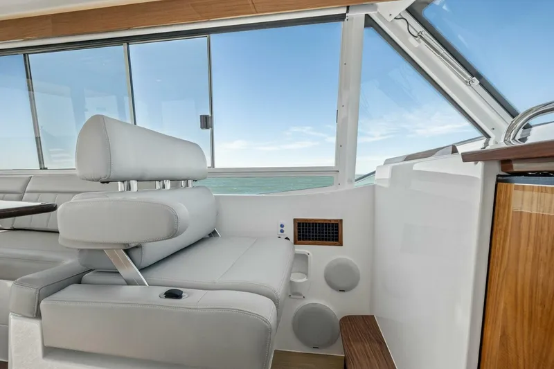 Slide: The Image of Luxurious interior of 2026 MJM 47R yacht with modern seating and ocean view. - 25