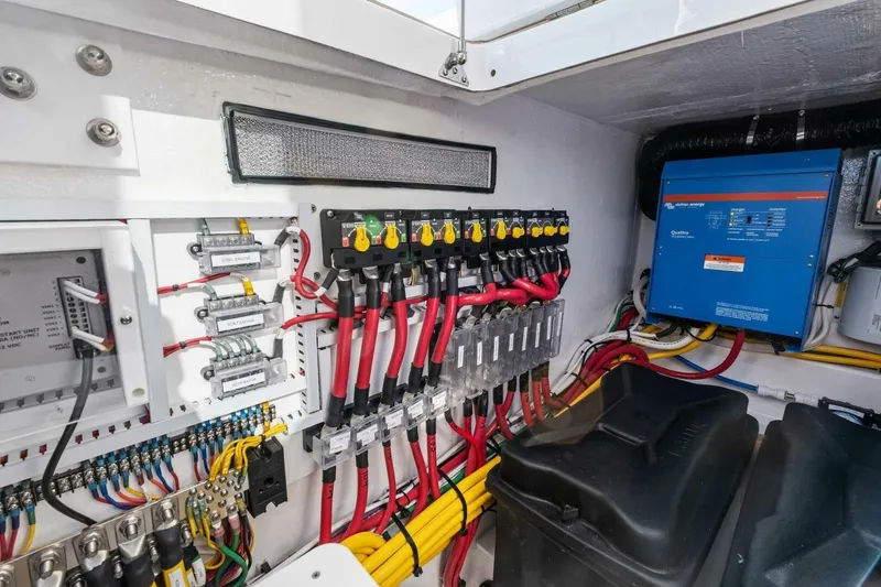 Slide: The Image of Electrical system of 2026 MJM 47R boat with wiring and control panels. - 33