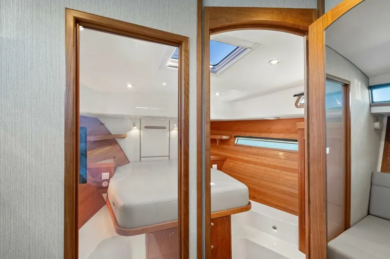 Slide: The Image of Luxurious interior of 2026 MJM 47R yacht with wood accents and modern design. - 8