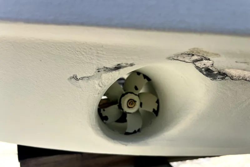 Slide: The Image of Damaged hull of 2021 Regal 26 XO boat with visible propeller. - 17