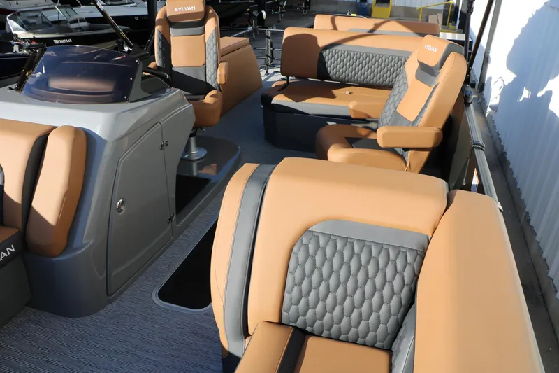 Slide: The Image of 2026 Sylvan L3 LZ DH Platinum Edition Tri-Toon interior with luxurious seating and modern design. - 24