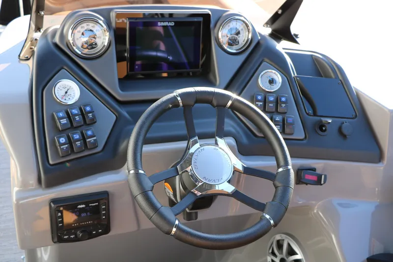 Slide: The Image of Steering console of 2026 Sylvan L3 LZ DH Platinum Edition Tri-Toon with advanced controls. - 41