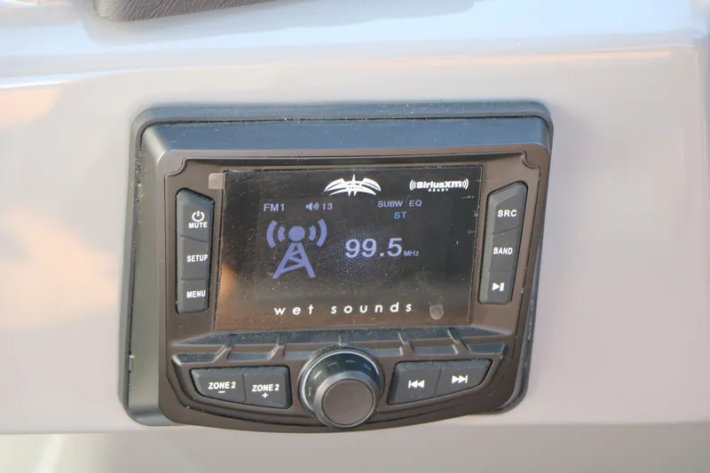 Slide: The Image of Boat stereo system displaying FM radio frequency, 99.5 MHz, on Sylvan L3 LZ DH Platinum Edition. - 42