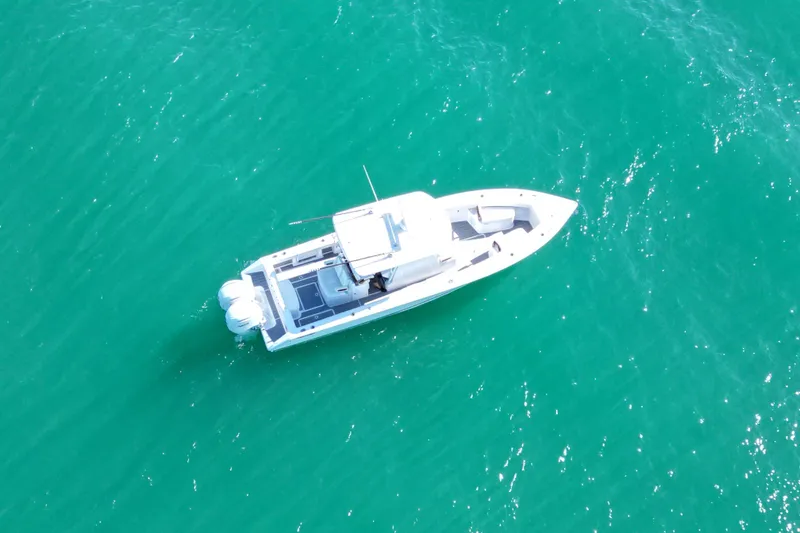 Slide: The Image of Aerial view of 2025 Jupiter 32 FS boat on turquoise water. - 15