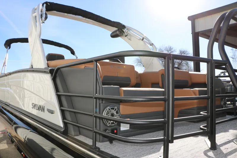 Slide: The Image of 2026 Sylvan G5 LZ DH Platinum Edition Tri-Toon boat with luxurious seating and sleek design. - 10