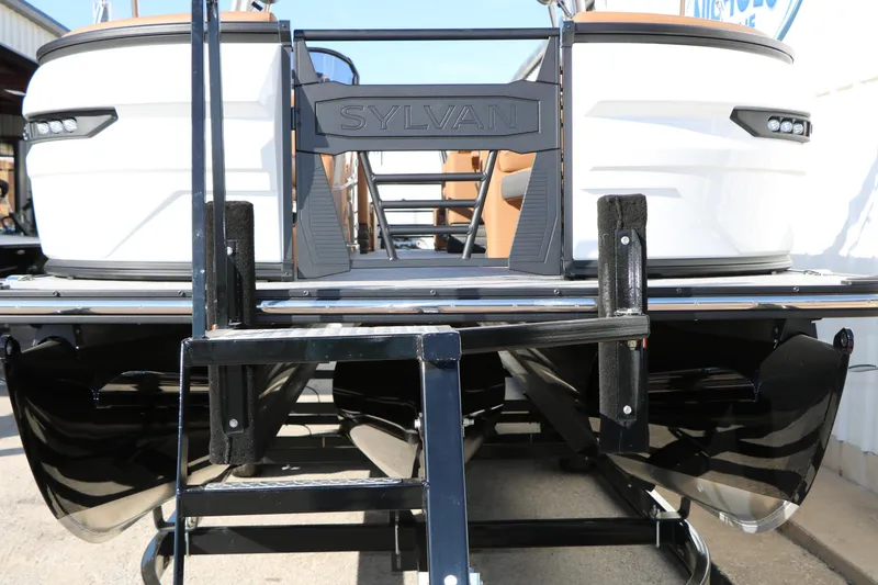 Slide: The Image of 2026 Sylvan G5 LZ DH Platinum Edition Tri-Toon boat, rear view on trailer. - 11