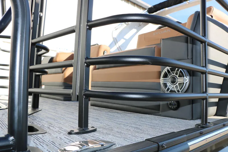 Slide: The Image of 2026 Sylvan G5 LZ DH Platinum Edition Tri-Toon interior with sleek railings and speaker. - 17