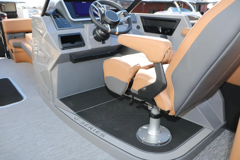 Slide: The Image of 2026 Sylvan G5 LZ DH Platinum Edition Tri-Toon helm with luxurious seating and modern controls. - 32