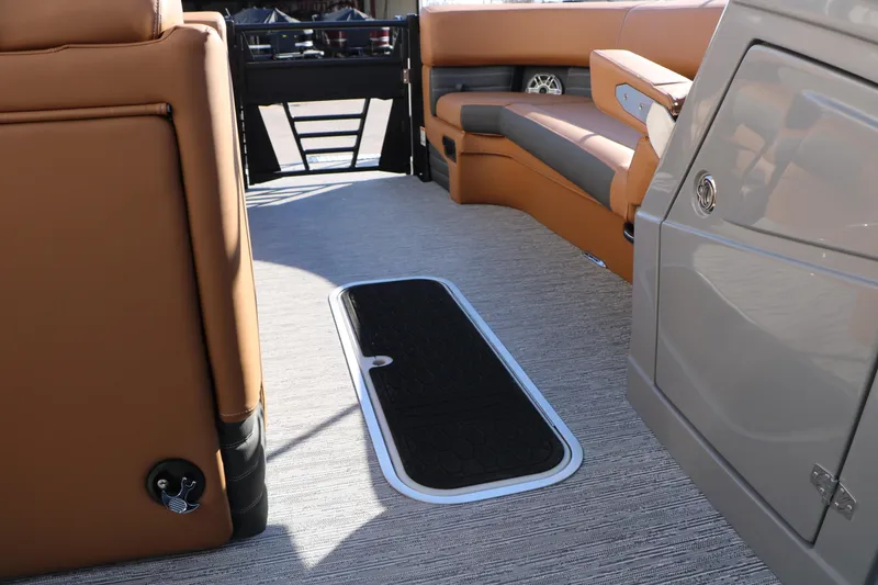 Slide: The Image of Luxurious interior of 2026 Sylvan G5 LZ DH Platinum Edition Tri-Toon with premium seating. - 33