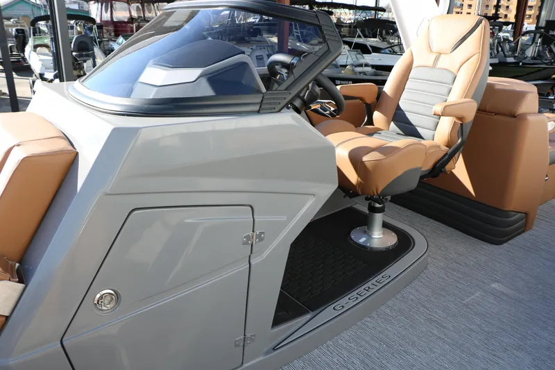 Slide: The Image of 2026 Sylvan G5 LZ DH Platinum Edition Tri-Toon helm with luxurious seating and modern controls. - 35