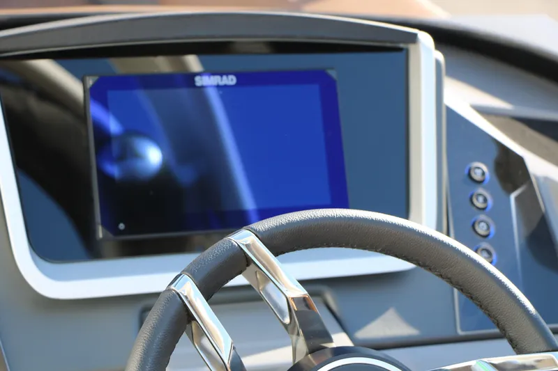 Slide: The Image of Steering wheel and dashboard of 2026 Sylvan G5 LZ DH Platinum Edition Tri-Toon. - 42
