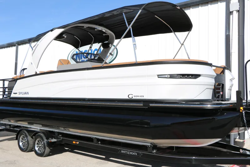 Slide: The Image of 2026 Sylvan G5 LZ DH Platinum Edition Tri-Toon boat on trailer, side view. - 47