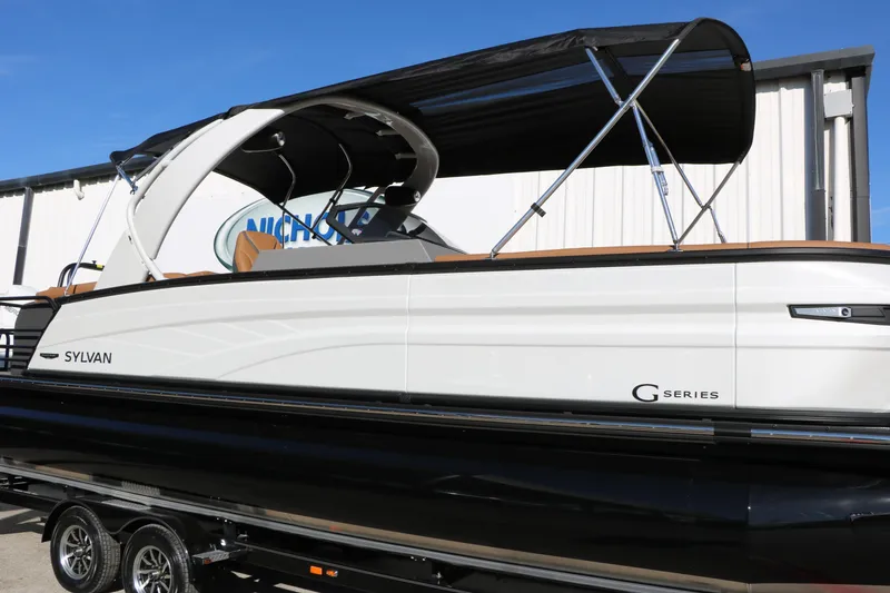 Slide: The Image of 2026 Sylvan G5 LZ DH Platinum Edition Tri-Toon boat with canopy, side view. - 48