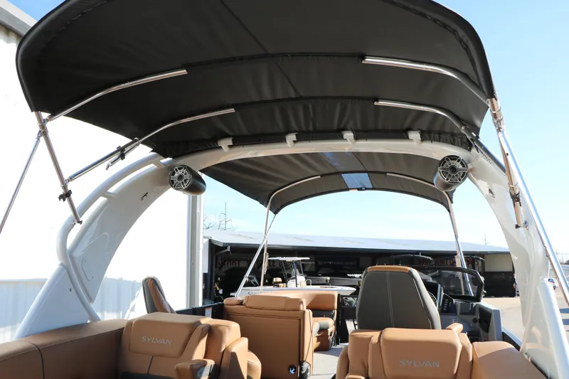 Slide: The Image of 2026 Sylvan G5 LZ DH Platinum Edition Tri-Toon with luxurious seating and canopy. - 51