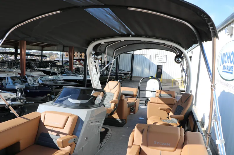 Slide: The Image of 2026 Sylvan G5 LZ DH Platinum Edition Tri-Toon boat with luxurious seating and canopy. - 53