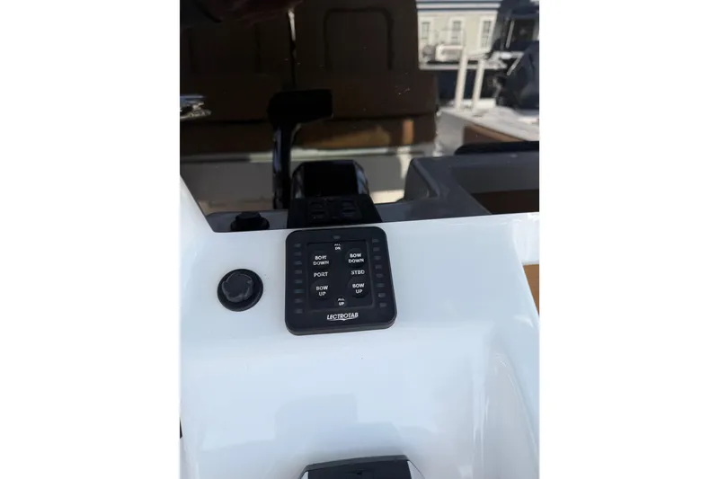 Slide: The Image of Control panel on 2023 Sea Pro 239 Deep V CC boat dashboard. - 15