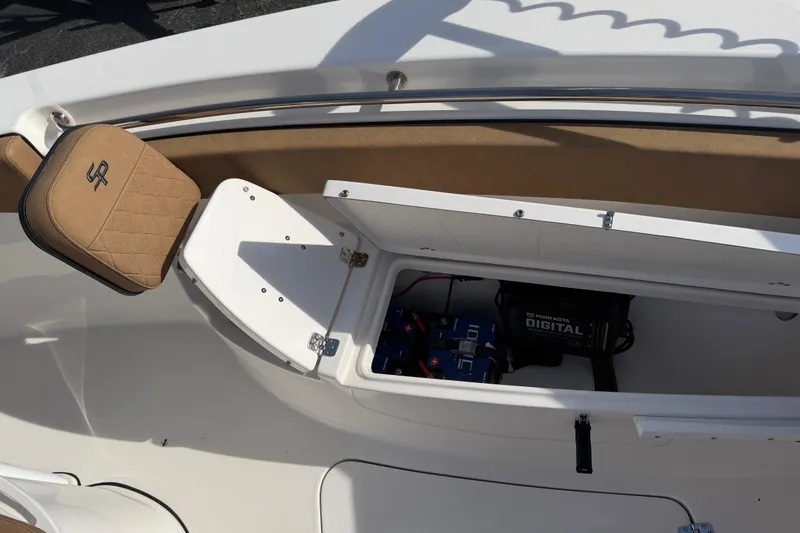 Slide: The Image of 2023 Sea Pro 239 Deep V CC boat with open storage compartment and seating. - 28