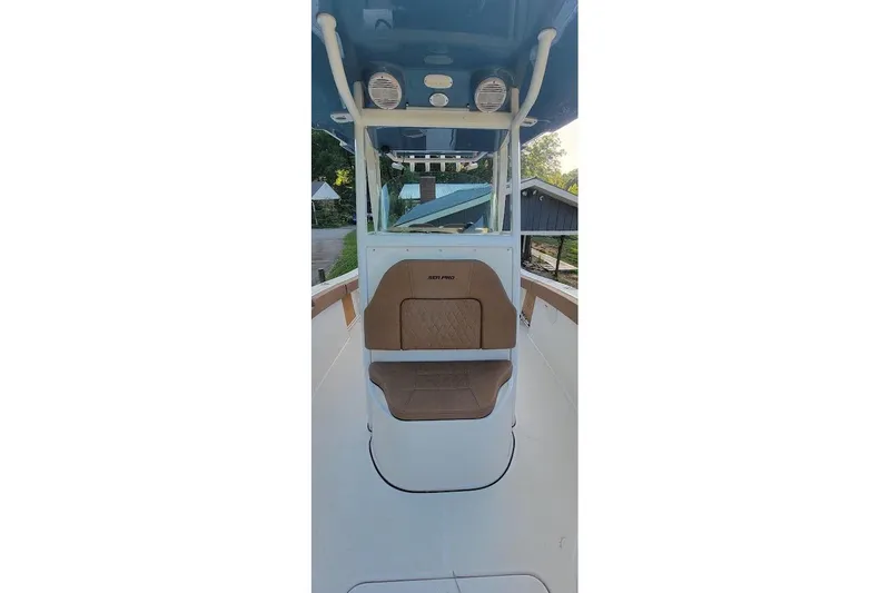 Slide: The Image of 2023 Sea Pro 239 Deep V CC boat interior with seating and console. - 5