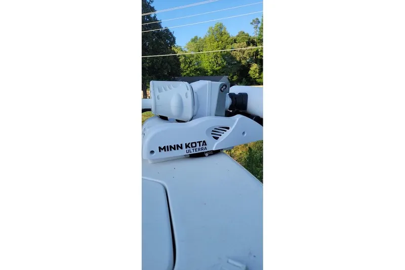 Slide: The Image of Minn Kota Ulterra motor on 2023 Sea Pro 239 Deep V CC boat. - 6