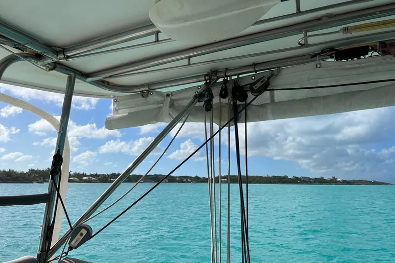 Slide: The Image of Sailing view from 2004 Island Spirit 400 catamaran, turquoise waters, and clear sky. - 28