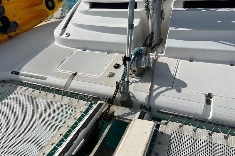 Slide: The Image of Deck of 2004 Island Spirit 400 catamaran with winch and netting. - 32