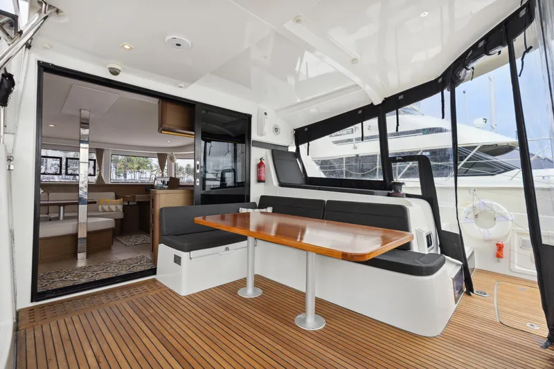 Slide: The Image of Interior of a 2019 Lagoon 42 yacht with wooden flooring. - 21