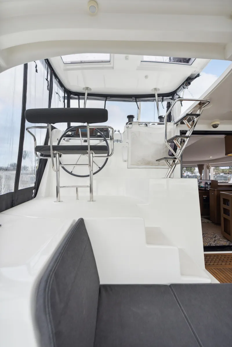 Slide: The Image of 2019 Lagoon 42 catamaran docked with sail cover. - 25