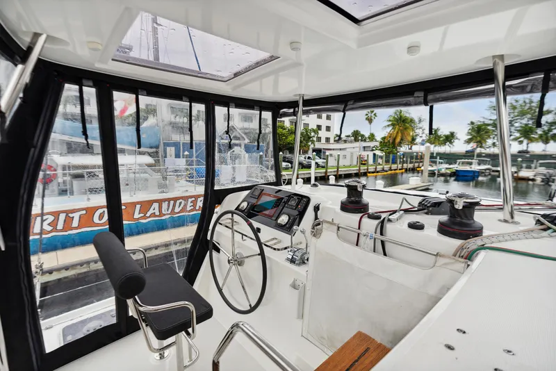 Slide: The Image of Interior view of 2019 Lagoon 42 yacht overlooking the harbor. - 36