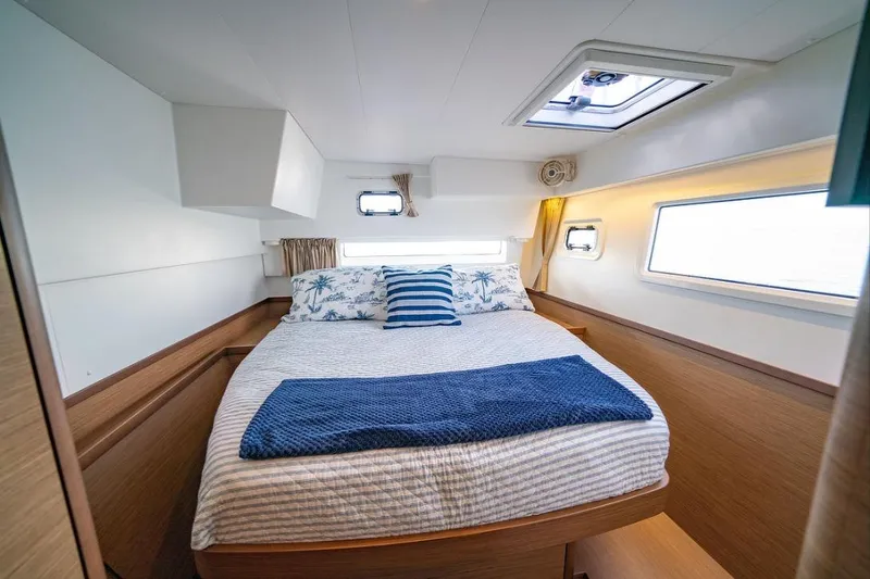 Slide: The Image of Luxurious bathroom interior of 2018 Lagoon 42 yacht with modern fixtures and wooden accents. - 15