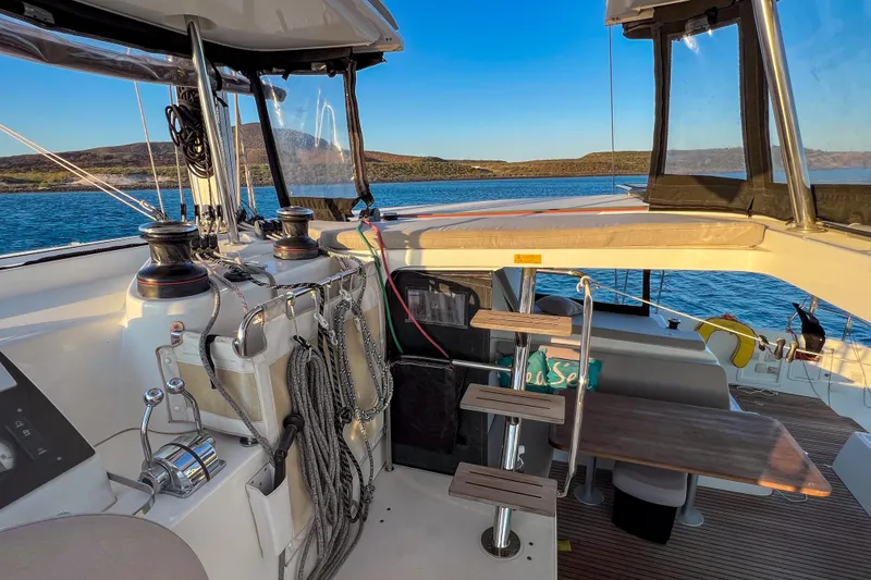 Slide: The Image of Luxurious interior of 2018 Lagoon 42 catamaran with cozy seating and nautical decor. - 4