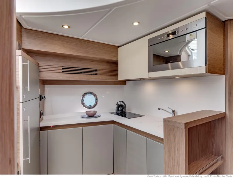 Slide: The Image of Modern kitchen interior of 2020 Beneteau Gran Turismo 46 yacht with sleek design. - 26
