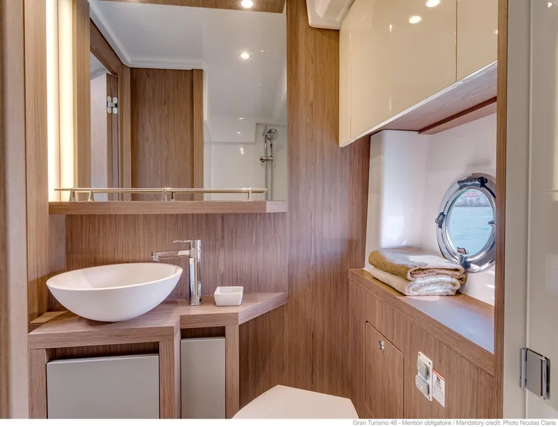 Slide: The Image of Interior of 2020 Beneteau Gran Turismo 46 yacht with cozy seating area. - 30