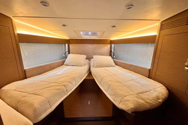 Slide: The Image of Luxurious twin cabin interior of 2020 Beneteau Gran Turismo 46 yacht. - 31