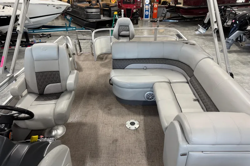 Slide: The Image of Interior of 2022 Ranger 223FC boat with plush seating and modern design. - 11