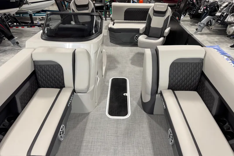 Slide: The Image of 2026 Sylvan L-5 Platinum boat interior with luxurious seating and modern design. - 8