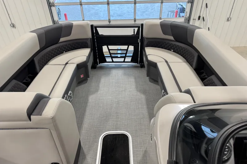Slide: The Image of 2026 Sylvan L-5 Platinum boat interior with luxurious seating and modern design. - 9