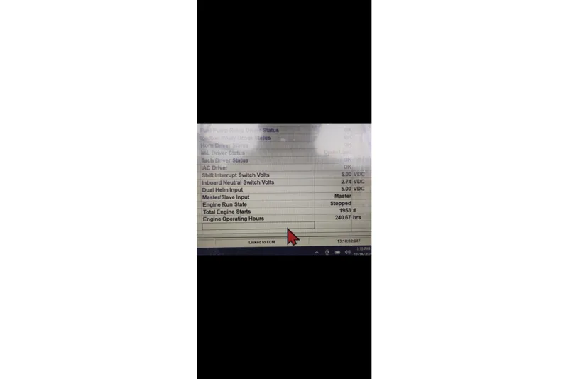 Slide: The Image of 2006 Monterey 234FS engine diagnostics display with voltage and operating hours data. - 18