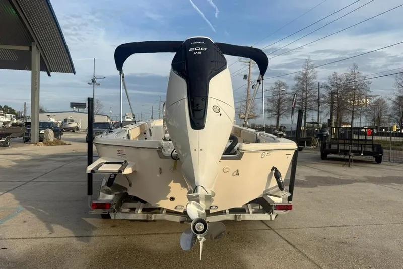 Slide: The Image of 2026 Sea Chaser 23 LX boat with powerful outboard motor on trailer. - 4