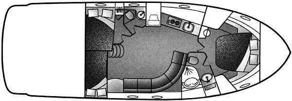 Slide: The Image of 1996 Trojan 440 Express Yacht with inflatable dinghy on deck, docked at marina. - 11