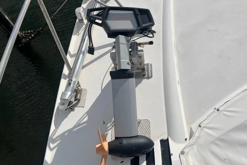 Slide: The Image of Cockpit of 1996 Trojan 440 Express Yacht with steering wheel and navigation controls. - 7