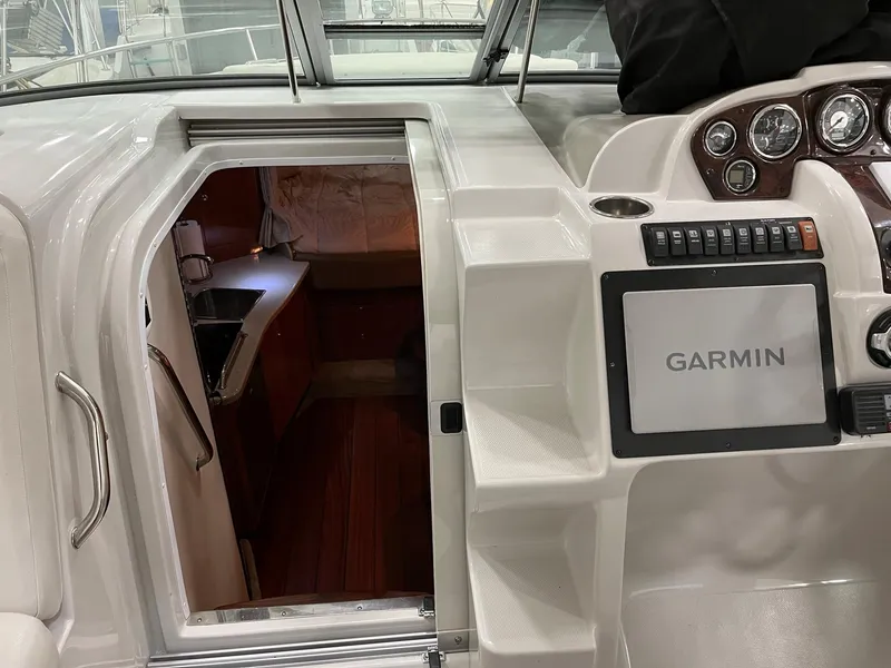 Slide: The Image of Crownline 350 CR 2011 with Garmin navigation and cabin entrance. - 10