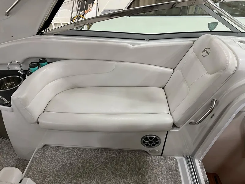 Slide: The Image of Interior of 2011 Crownline 350 CR with white leather seating. - 12