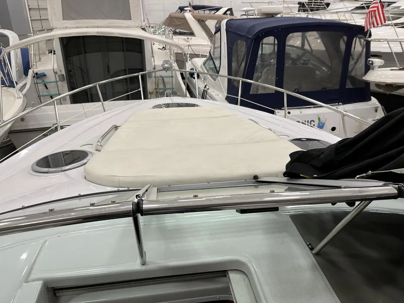 Slide: The Image of 2011 Crownline 350 CR boat docked in marina. - 14